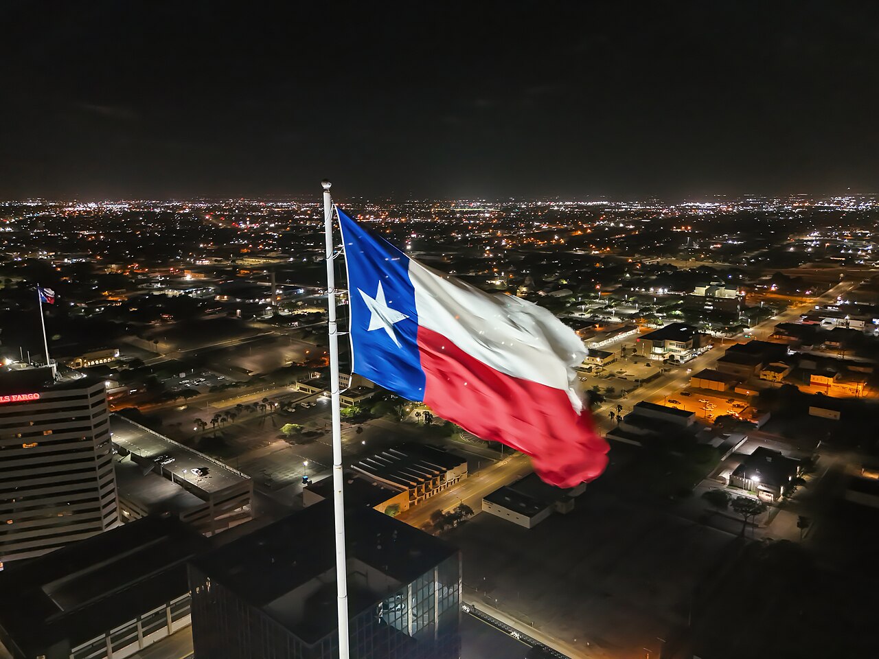Texas flag above Corpus Christi